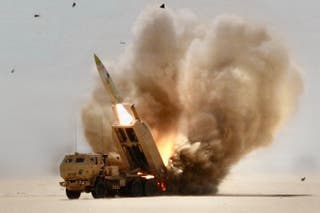 This US Army handout photo taken on March 2, 2026, and released on March 13, 2026, by US Central Command Public Affairs shows a M142 High Mobility Artillery Rocket Systems (HIMARS) conducting live-fire missions during